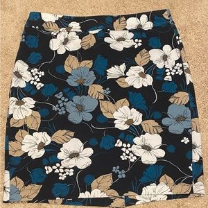 Ann Taylor Navy Blue with Floral print pencil skirt. Size 8